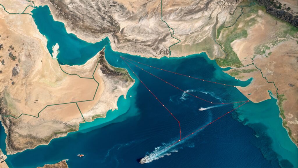 Aerial View of the Strategic Hormuz Strait Highlighted on a Detailed Map Illustrating Maritime Routes and Geopolitical Importance in the Middle East Region